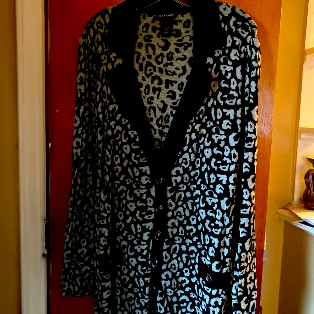 Long light weight sweater. New without tags.